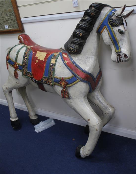A carved and painted carousel horse, attributed to the Philadelphia Toboggan Company, 3ft 8in.